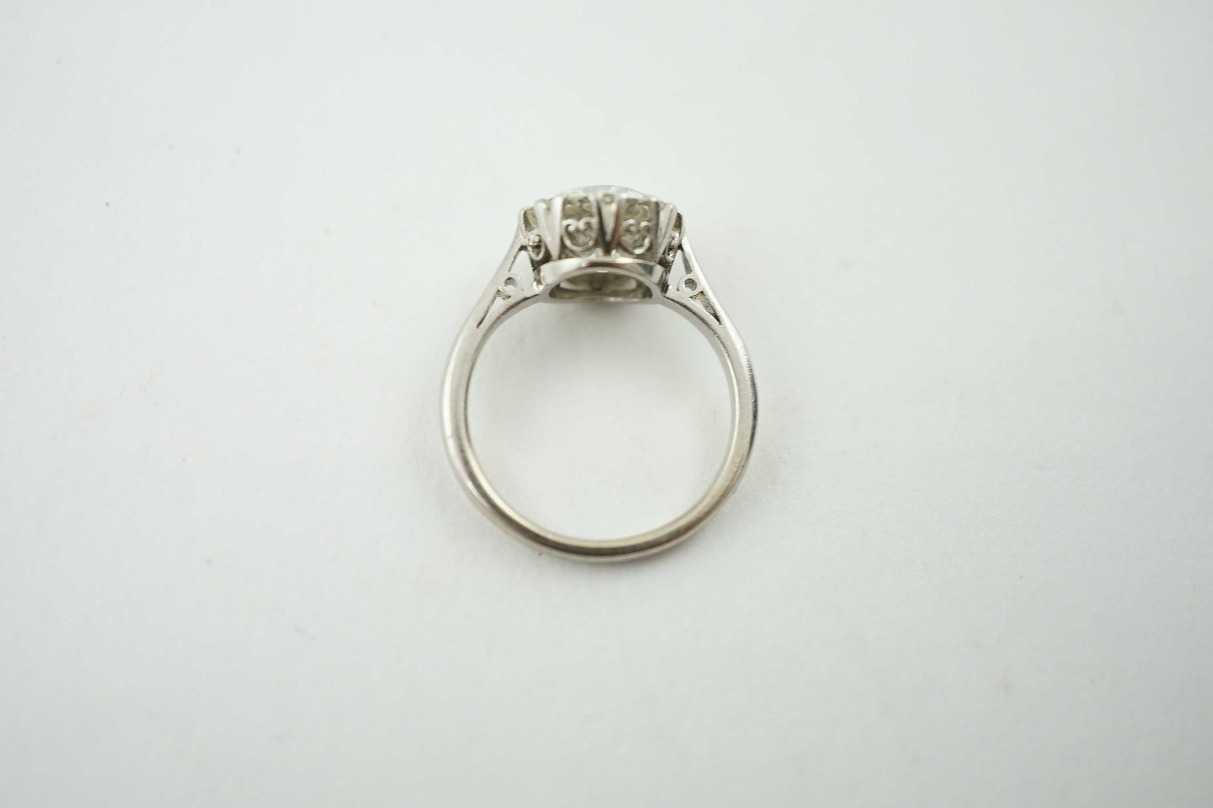 A platinum and solitaire diamond set ring